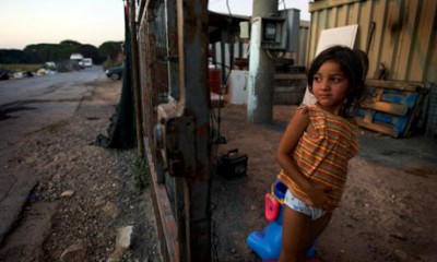 Roma bevándorlók tábora Olaszországban. Forrás: The Guardian